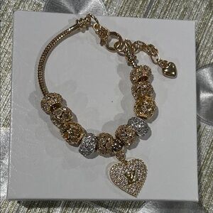 Stunning Gold, Silver, Rose Gold plated LV Heart Charm Bracelet.